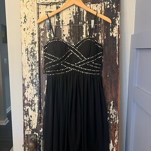 Betsy & Adam black embellished metallic stud high low dress. LBD size 6.